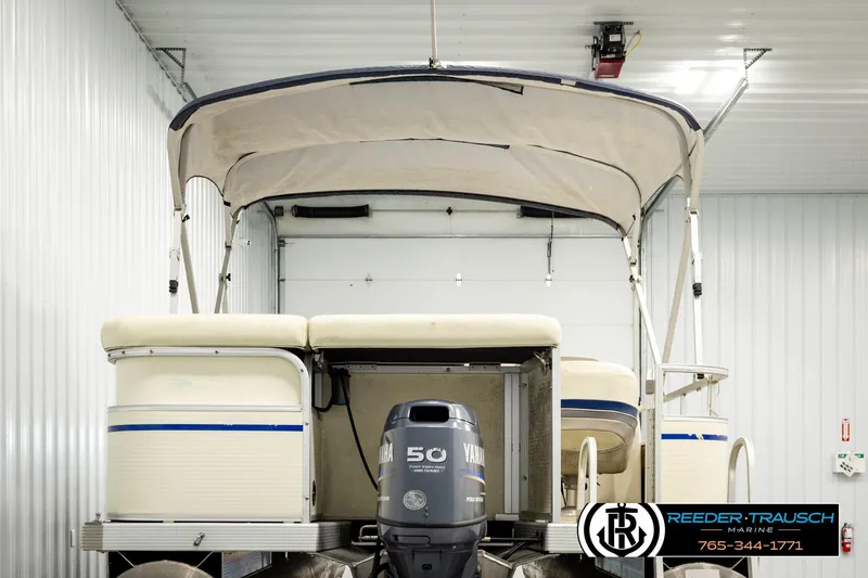Slide: The Image of 2008 Sedona 20 CR pontoon boat with Yamaha 50 engine in indoor storage. - 7