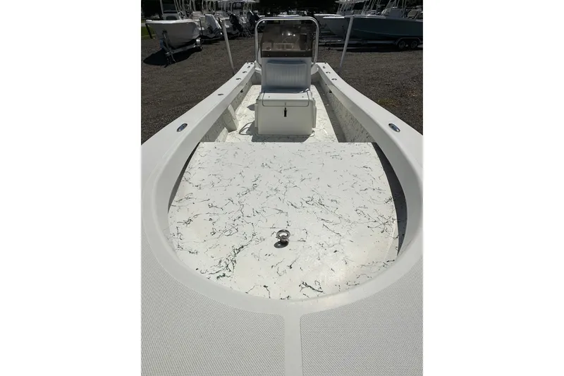 Slide: The Image of 2007 Panga Marine 18 boat interior with marbled deck and seating. - 10