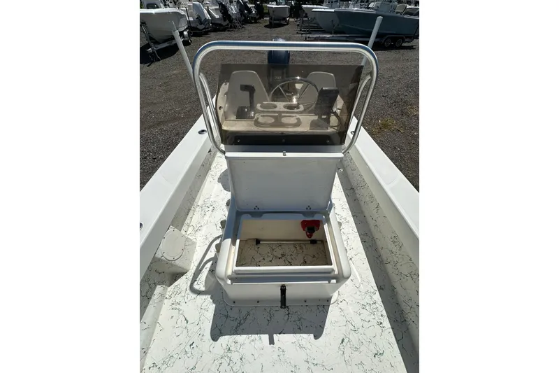 Slide: The Image of 2007 PANGA MARINE 18 boat interior with console and storage compartment. - 17