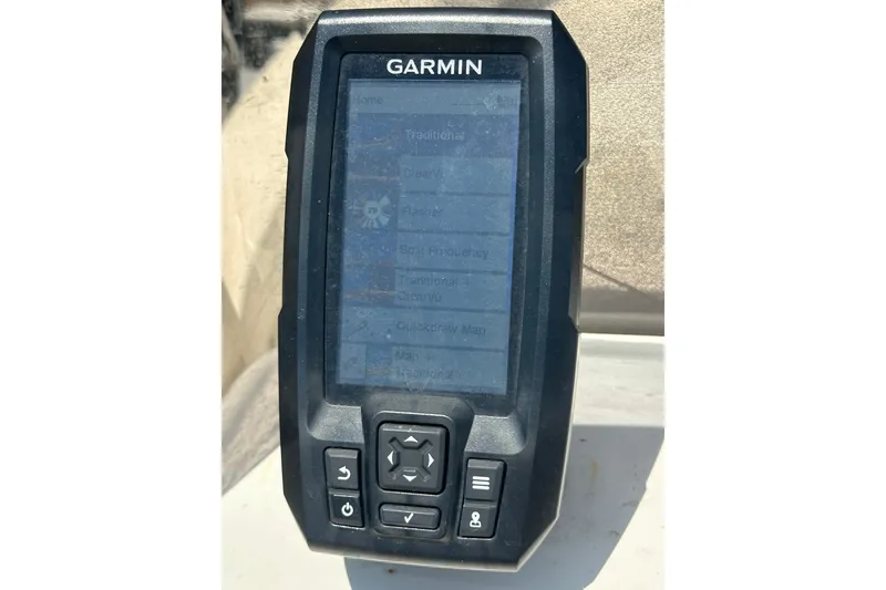 Slide: The Image of Garmin GPS device on 2007 Panga Marine 18 boat dashboard. - 20