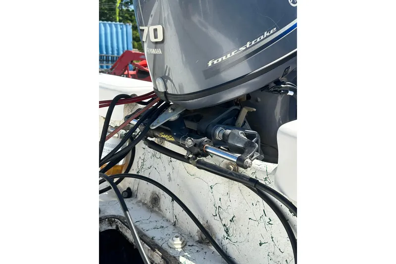 Slide: The Image of Outboard motor on 2007 PANGA MARINE 18 boat, featuring Yamaha 70 four-stroke engine. - 22