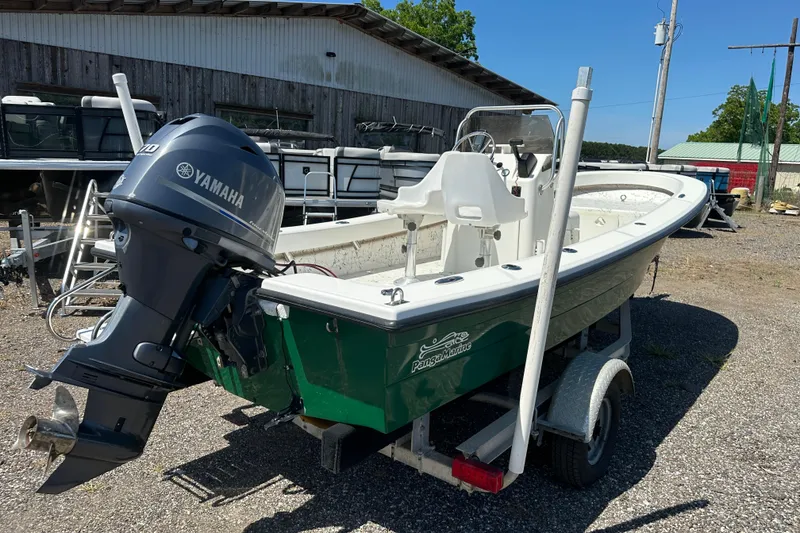 Slide: The Image of 2007 Panga Marine 18 boat with Yamaha engine on trailer, parked outdoors. - 6