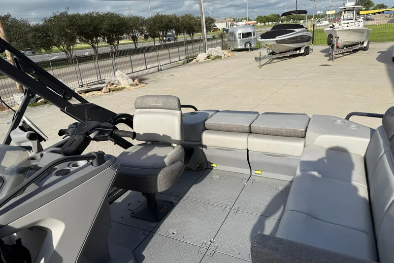 Slide: The Image of 2023 Sea-Doo Switch Sport 18 interior with spacious seating and modern design. - 13