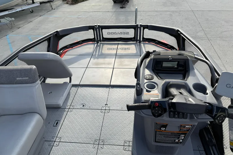 Slide: The Image of 2023 Sea-Doo Switch Sport 18 interior with steering console and seating. - 15