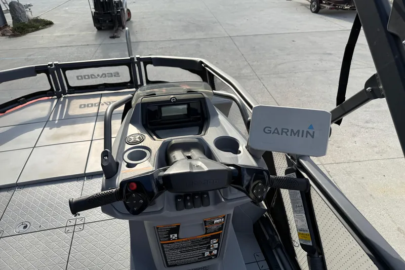 Slide: The Image of 2023 Sea-Doo Switch Sport 18 dashboard with Garmin navigation system. - 16