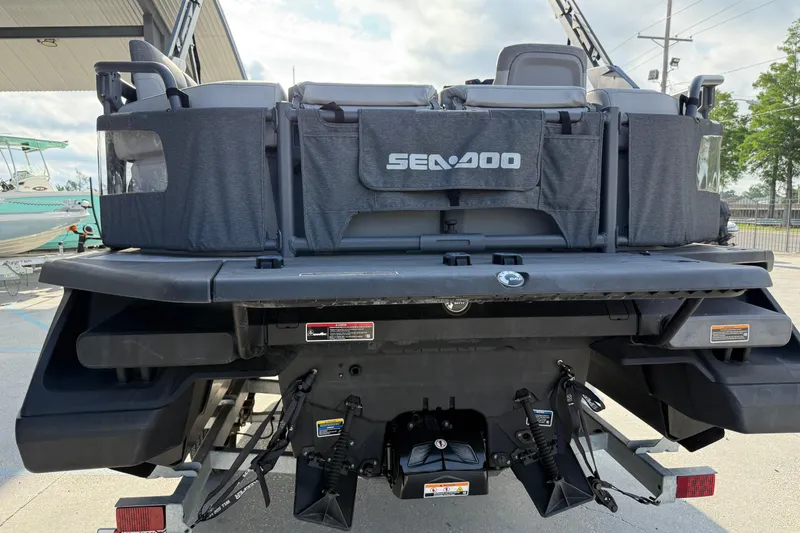 Slide: The Image of 2023 Sea-Doo Switch Sport 18 rear view, showcasing seating and design features. - 7