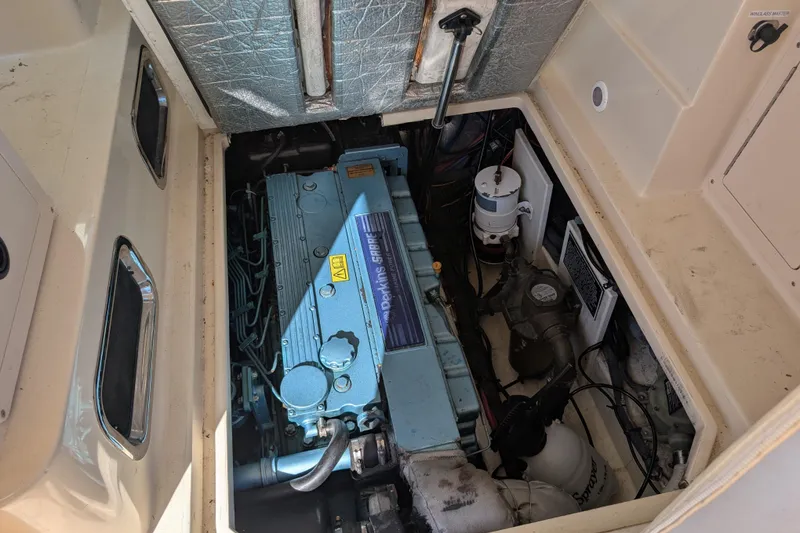 Slide: The Image of Engine compartment of a 2004 Albin 30 Family Cruiser with Perkins engine. - 48