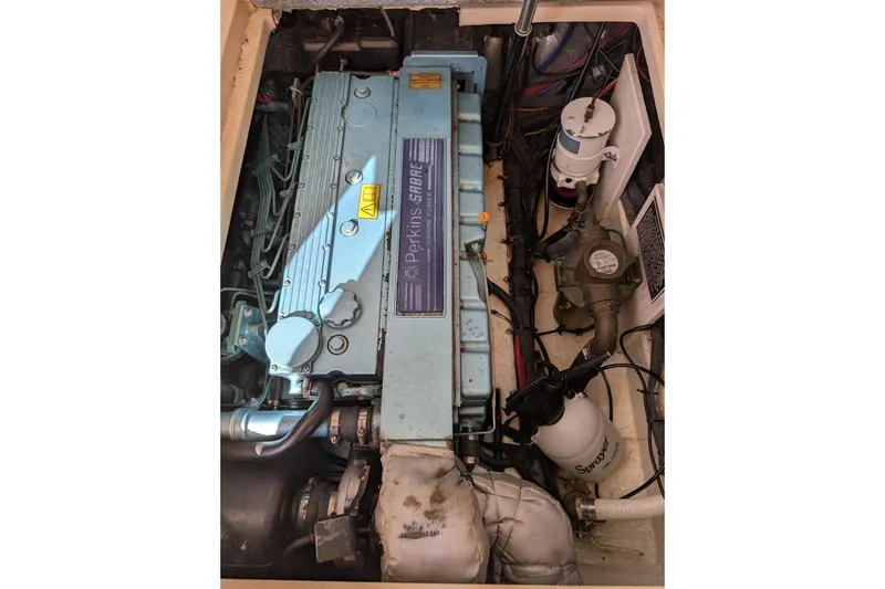 Slide: The Image of Engine compartment of a 2004 Albin 30 Family Cruiser with Perkins Sabre engine. - 49
