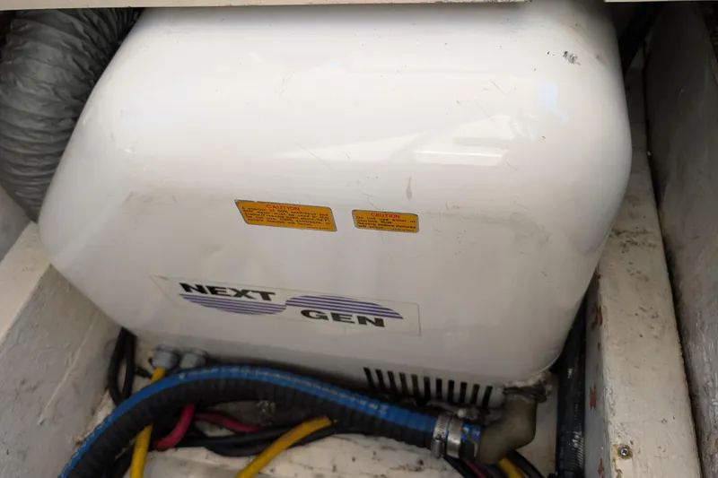 Slide: The Image of Next Gen generator in 2004 Albin 30 Family Cruiser engine compartment. - 55