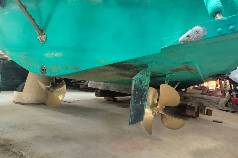 Slide: The Image of 1990 Little Harbor Express boat propellers and rudder in dry dock. - 18