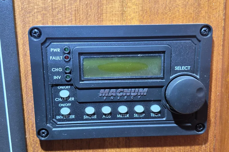 Slide: The Image of Magnum Energy control panel on 1990 Little Harbor Express boat. - 24