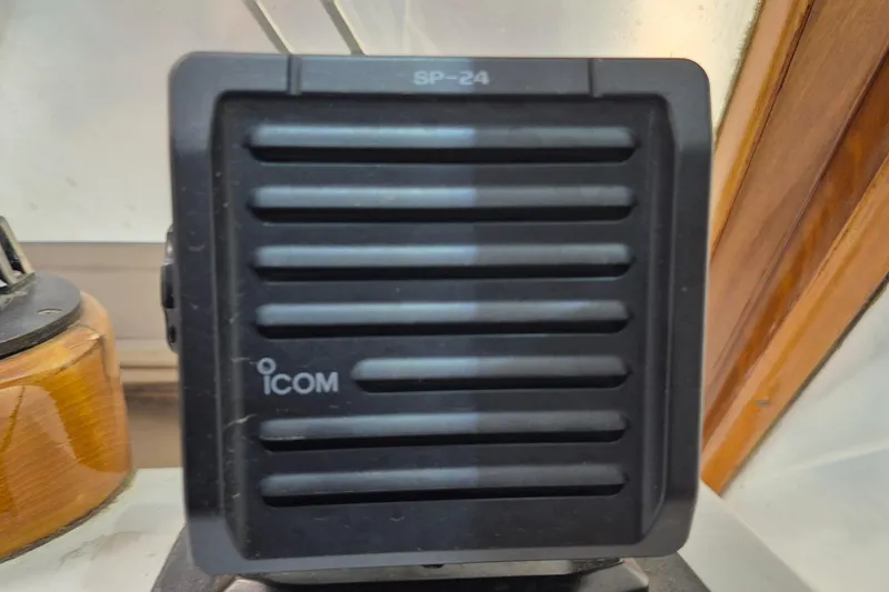 Slide: The Image of Icom SP-24 speaker on 1990 Little Harbor Express boat interior. - 31