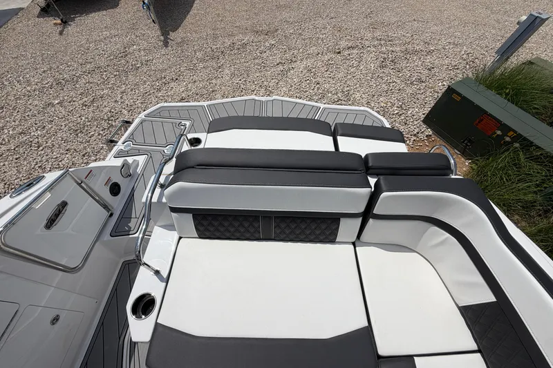 Slide: The Image of 2025 Monterey M6 boat interior with sleek seating and modern design elements. - 11