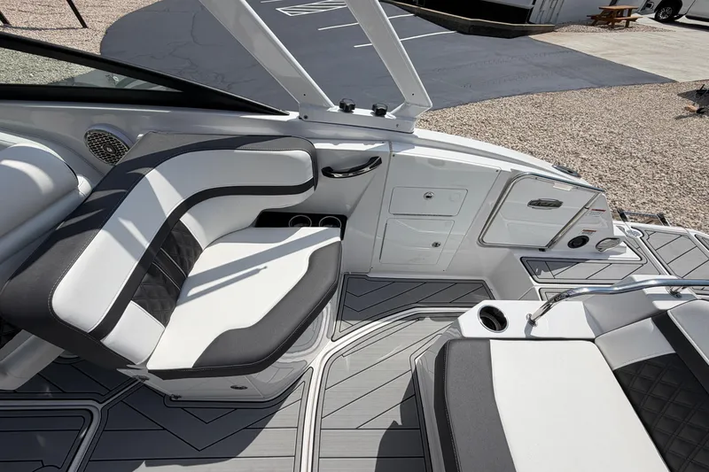 Slide: The Image of 2025 Monterey M6 boat interior with sleek seating and modern design elements. - 12