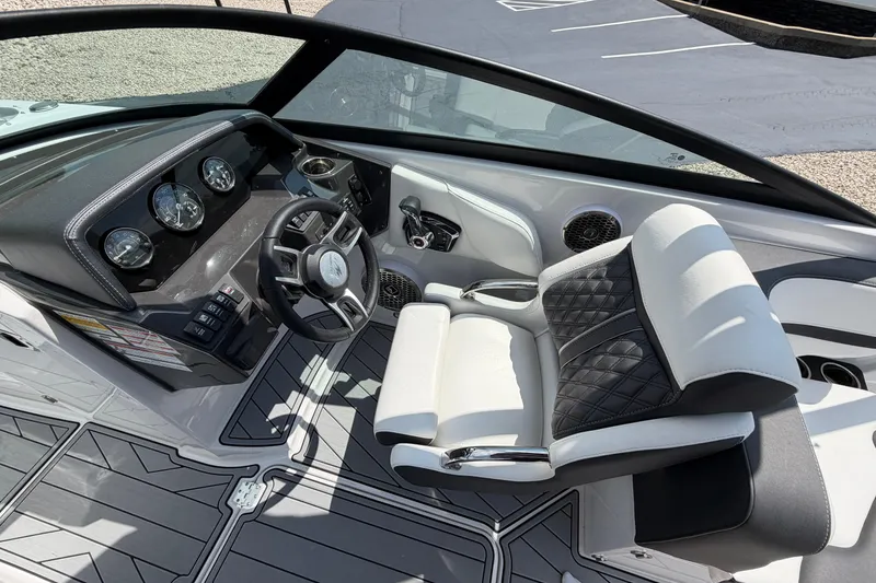 Slide: The Image of Luxurious 2025 Monterey M6 boat cockpit with modern steering and plush seating. - 15