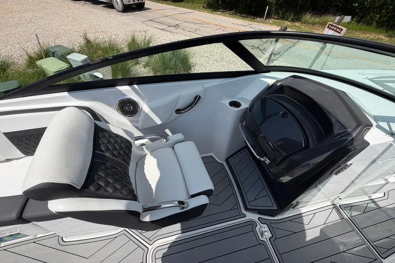 Slide: The Image of Luxurious interior of 2025 Monterey M6 boat with sleek seating and modern dashboard design. - 16