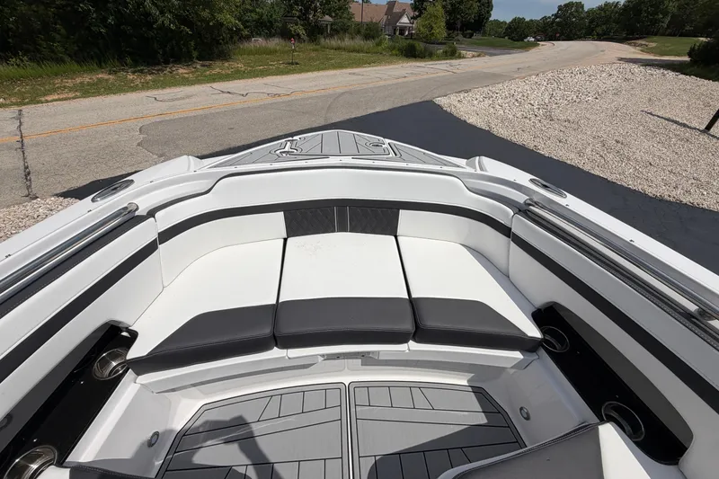 Slide: The Image of 2025 Monterey M6 boat interior with sleek seating and modern design. - 21