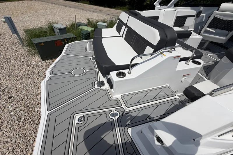 Slide: The Image of 2025 Monterey M6 boat interior with sleek seating and modern design elements. - 9