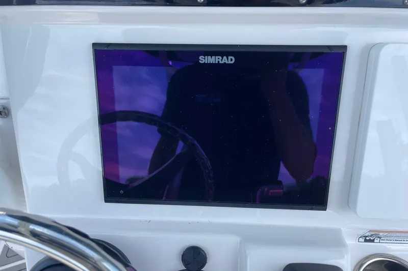 Slide: The Image of Simrad display on 2018 Everglades 230 Center Console boat dashboard. - 10