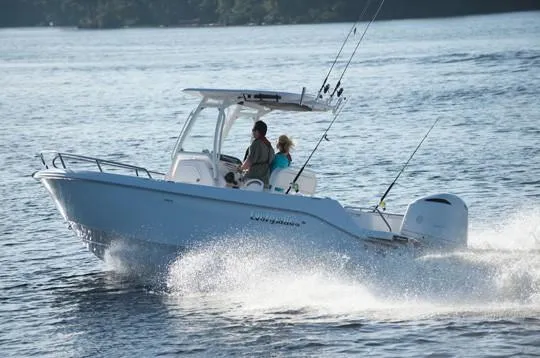 Slide: The Image of Manufacturer Provided Image: 2018 Everglades 230 Center Console boat cruising on a lake. - 25