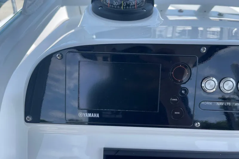 Slide: The Image of Control panel of a 2018 Everglades 230 Center Console boat with Yamaha display. - 9