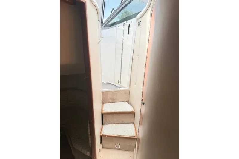 Slide: The Image of Interior stairs of 2002 Chaparral 350 Signature yacht, leading to deck area. - 14