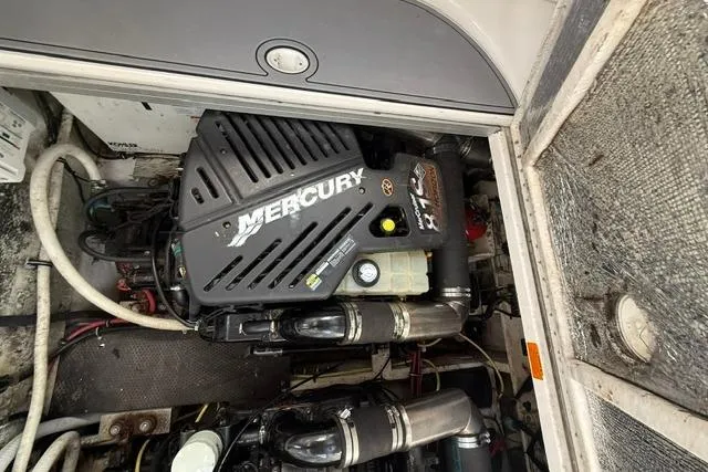 Slide: The Image of Engine compartment of a 2002 Chaparral 350 Signature with a Mercury engine. - 28
