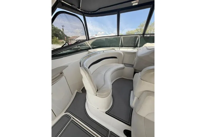 Slide: The Image of Interior of 2002 Chaparral 350 Signature boat with white seating and panoramic windows. - 4