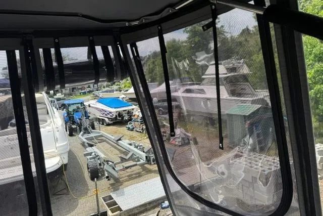 Slide: The Image of View from Chaparral 350 Signature 2002, overlooking boats and trailers in a marina. - 5
