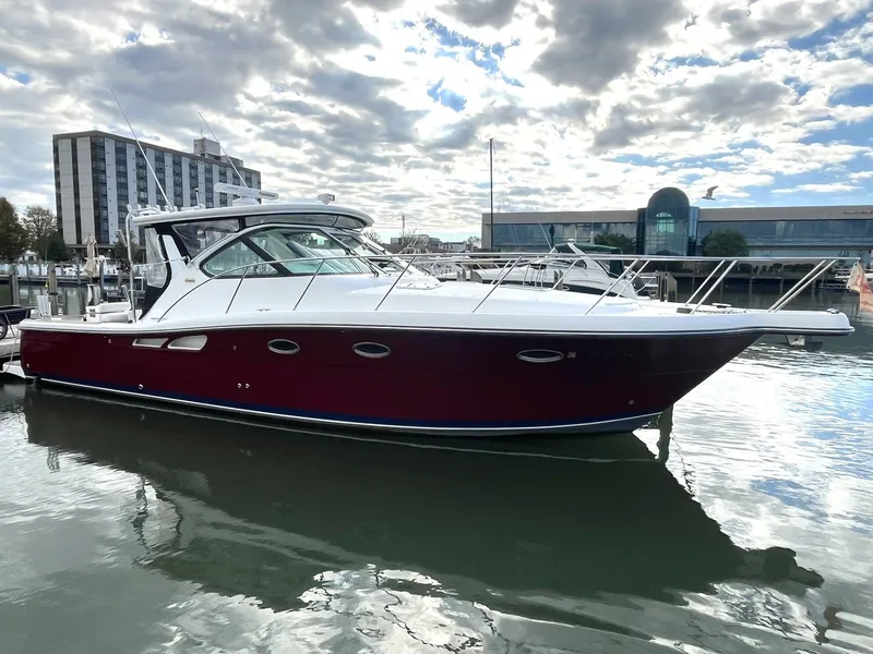 The Image of 2006 Tiara Yachts 3600 Open docked, cloudy sky. - 0