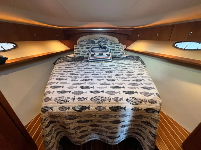 Slide: The Image of Interior of 2006 Tiara Yachts 3600 Open with cozy bed. - 35
