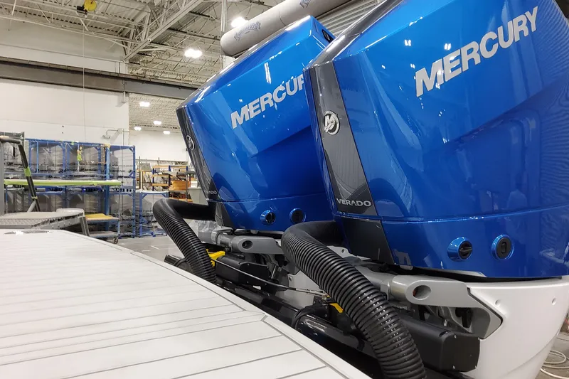 Slide: The Image of Twin Mercury Verado outboard engines on a 2027 Formula 330 Crossover Bowrider OB. - 17