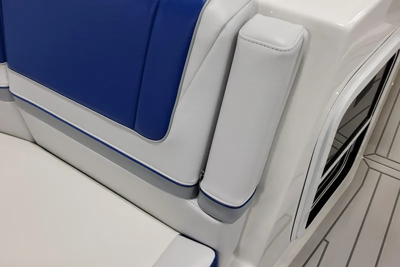 Slide: The Image of 2027 Formula 330 Crossover Bowrider OB interior seating, featuring blue and white upholstery. - 27