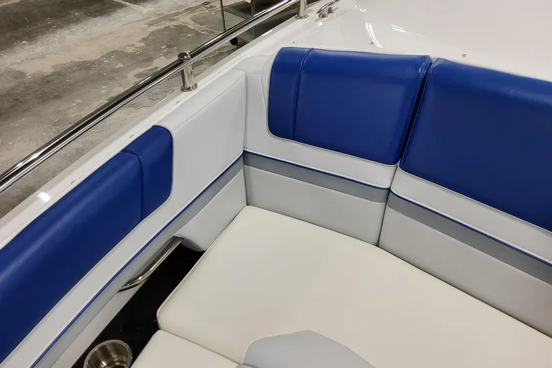 Slide: The Image of 2027 Formula 330 Crossover Bowrider OB interior with blue and white seating. - 29