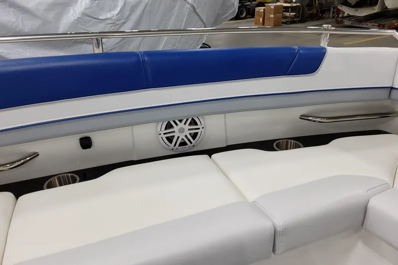 Slide: The Image of Interior seating of 2027 Formula 330 Crossover Bowrider OB, featuring blue and white upholstery. - 34