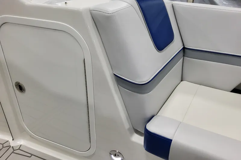 Slide: The Image of 2027 Formula 330 Crossover Bowrider OB interior seating with blue and white upholstery. - 36