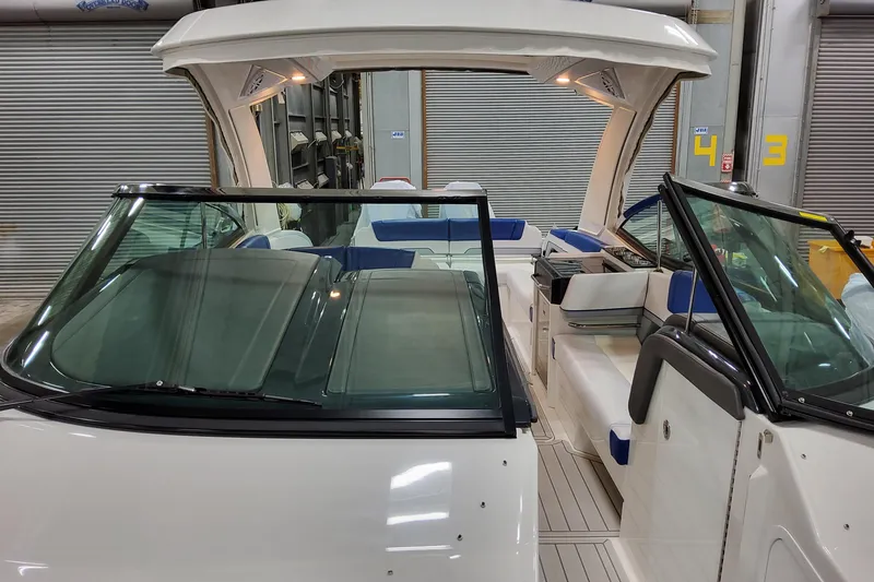 Slide: The Image of 2027 Formula 330 Crossover Bowrider OB interior view, showcasing seating and helm area. - 37