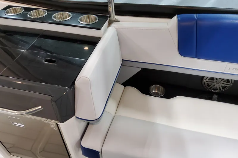 Slide: The Image of Interior of 2027 Formula 330 Crossover Bowrider OB with sleek seating and cup holders. - 46
