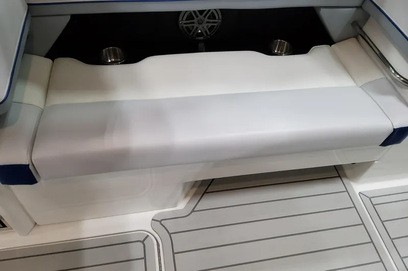Slide: The Image of 2027 Formula 330 Crossover Bowrider OB interior seating with cup holders and speaker. - 47