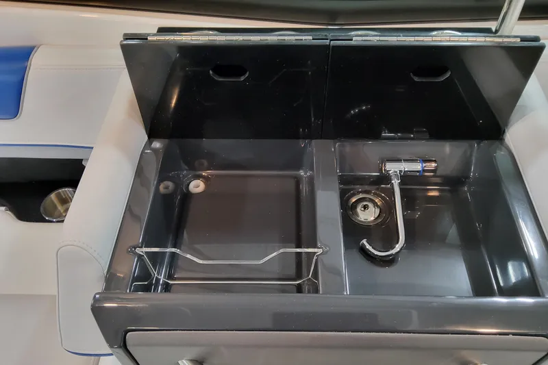 Slide: The Image of 2027 Formula 330 Crossover Bowrider OB sink and storage compartment detail. - 49