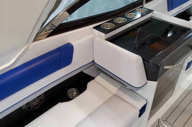Slide: The Image of Luxurious interior of 2027 Formula 330 Crossover Bowrider OB with sleek seating and cup holders. - 50