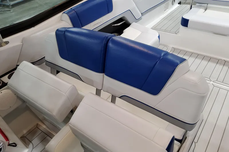 Slide: The Image of 2027 Formula 330 Crossover Bowrider OB interior with blue and white seating. - 60