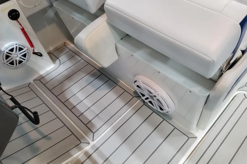 Slide: The Image of Interior of 2027 Formula 330 Crossover Bowrider OB, featuring seating and marine speakers. - 61