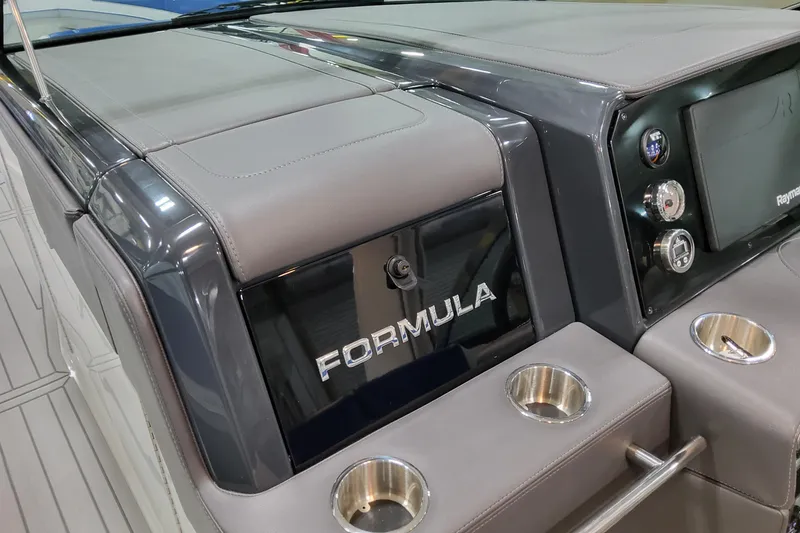 Slide: The Image of 2027 Formula 330 Crossover Bowrider OB dashboard with sleek design and modern controls. - 62