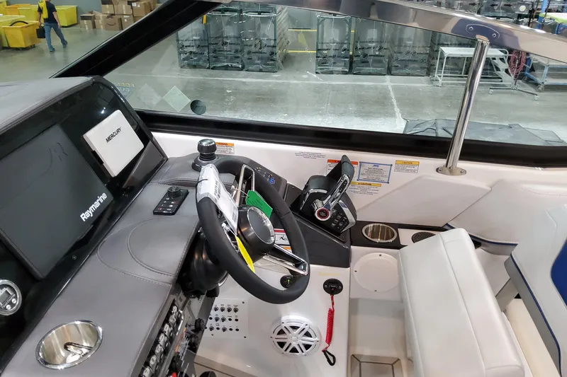 Slide: The Image of 2027 Formula 330 Crossover Bowrider OB cockpit with advanced controls and navigation systems. - 64