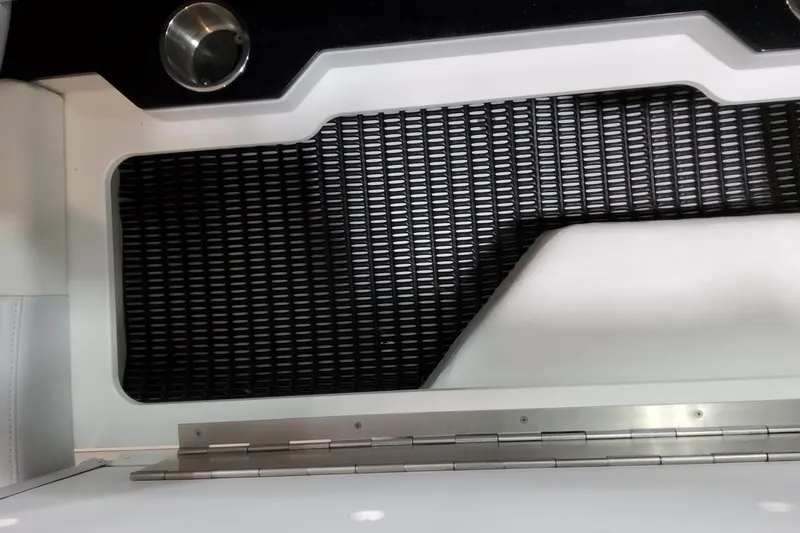 Slide: The Image of Interior detail of 2027 Formula 330 Crossover Bowrider OB boat with black textured flooring. - 66