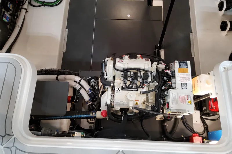 Slide: The Image of Engine compartment of 2027 Formula 330 Crossover Bowrider OB, showcasing detailed mechanical components. - 71