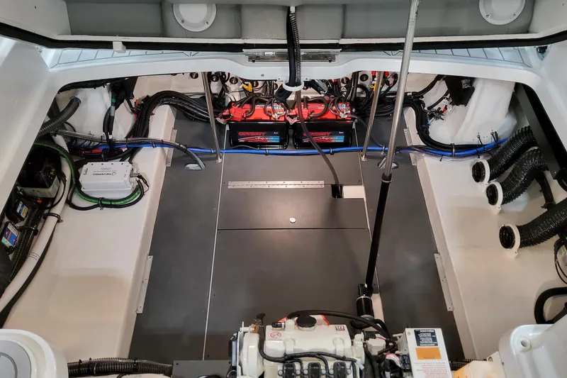 Slide: The Image of Engine compartment of 2027 Formula 330 Crossover Bowrider OB, showcasing wiring and components. - 72