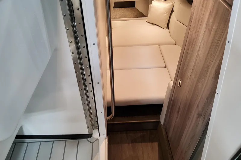 Slide: The Image of Interior cabin of 2027 Formula 330 Crossover Bowrider OB with plush seating. - 79