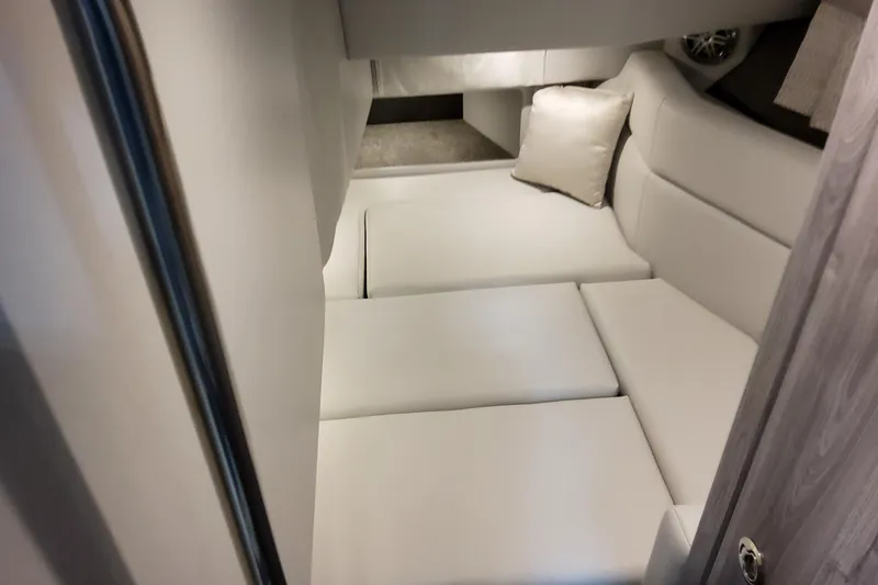 Slide: The Image of Interior cabin of 2027 Formula 330 Crossover Bowrider OB, featuring plush seating and modern design. - 80